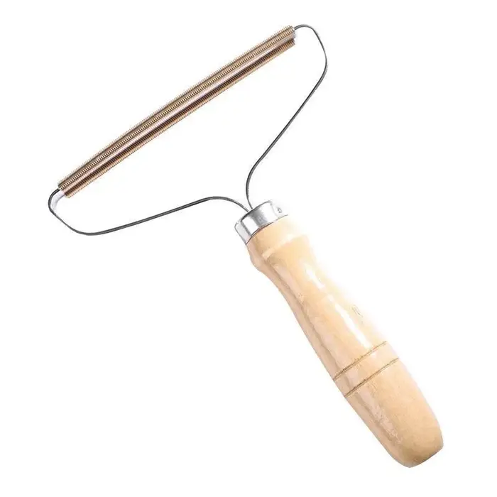 Brosse manuelle anti-peluches et poils d'animaux