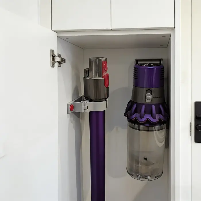 Support mural pour aspirateur avec trous de 5
