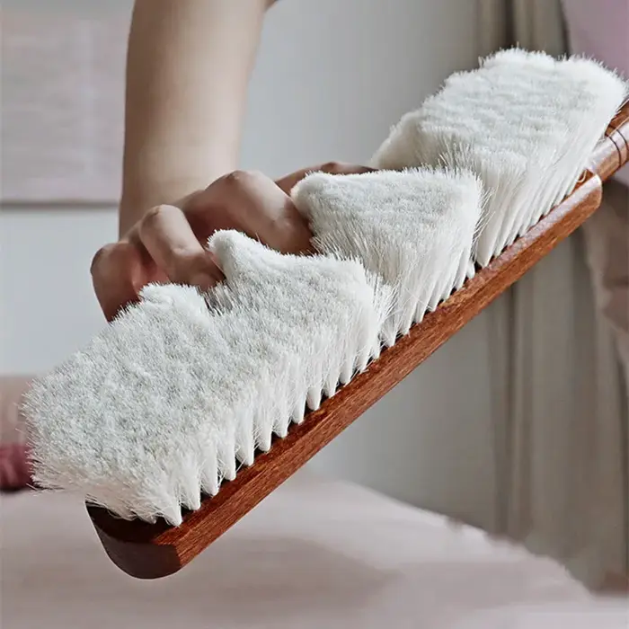 Brosse de balayage de lit