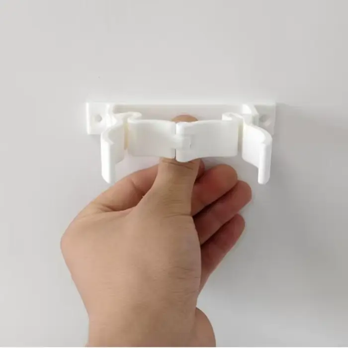 Support d'aspirateur en plastique