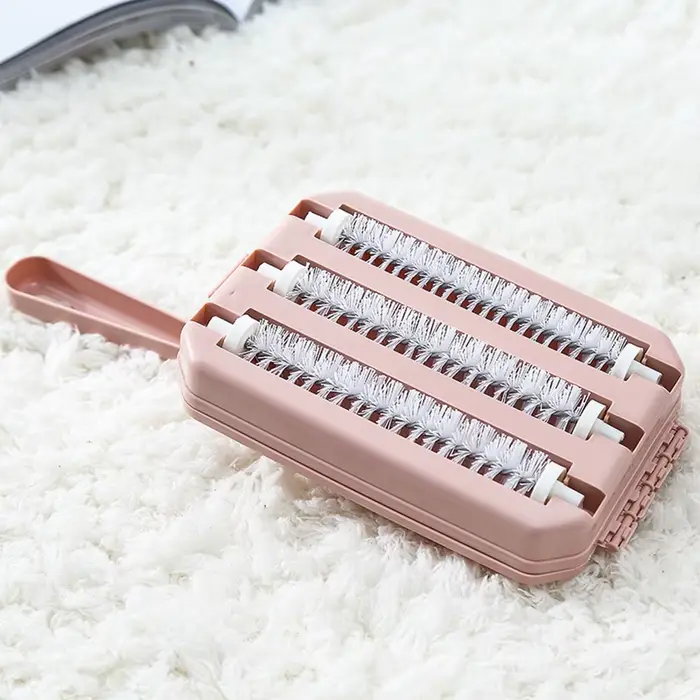 Brosse électrostatique pour balayeuse de sol et tapis