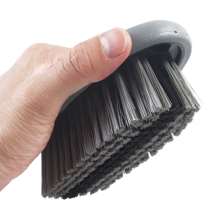 Brosse de nettoyage pour tapis et tissus d'ameublement