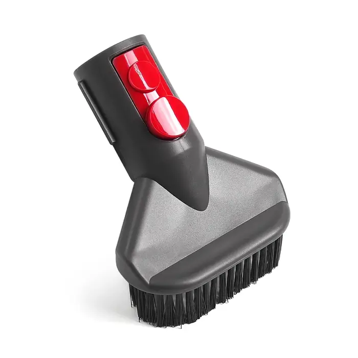 Tête de brosse multifonctionnelle à poils rigides