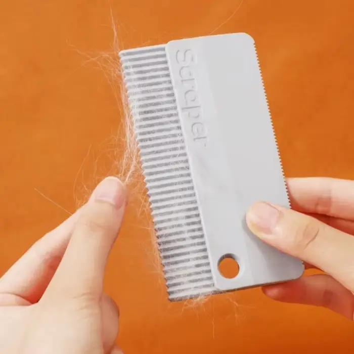 Brosse de nettoyage pour poils d'animaux