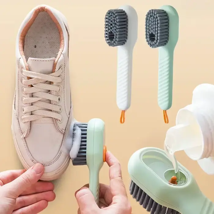 Brosse de nettoyage avec distributeur de savon
