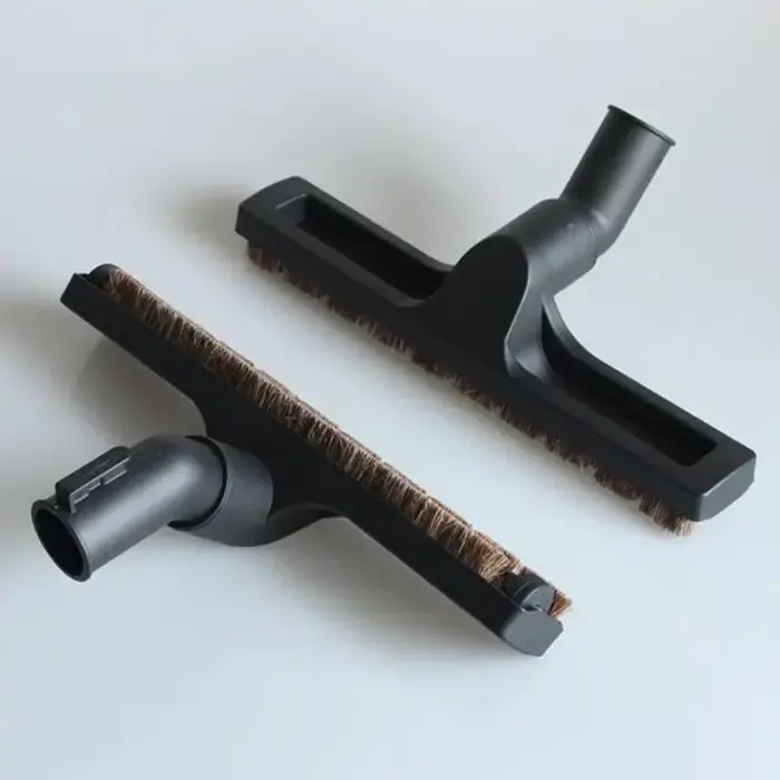 Tête de brosse à dépoussiérer