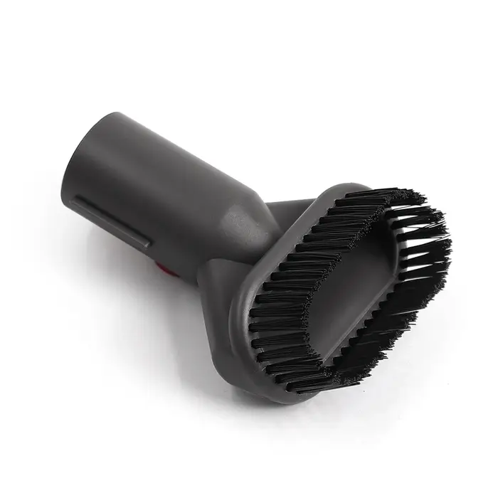 Tête de brosse multifonctionnelle à poils rigides