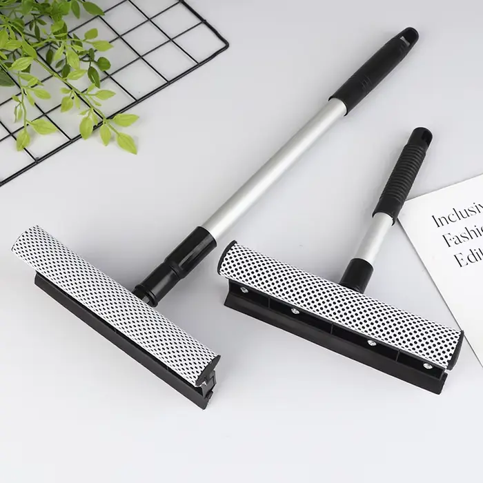 Raclette de nettoyage de vitres de voiture
