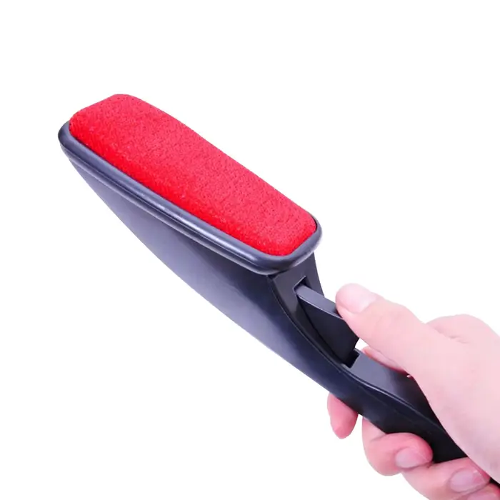 Brosse magique anti-poussière pour peluches