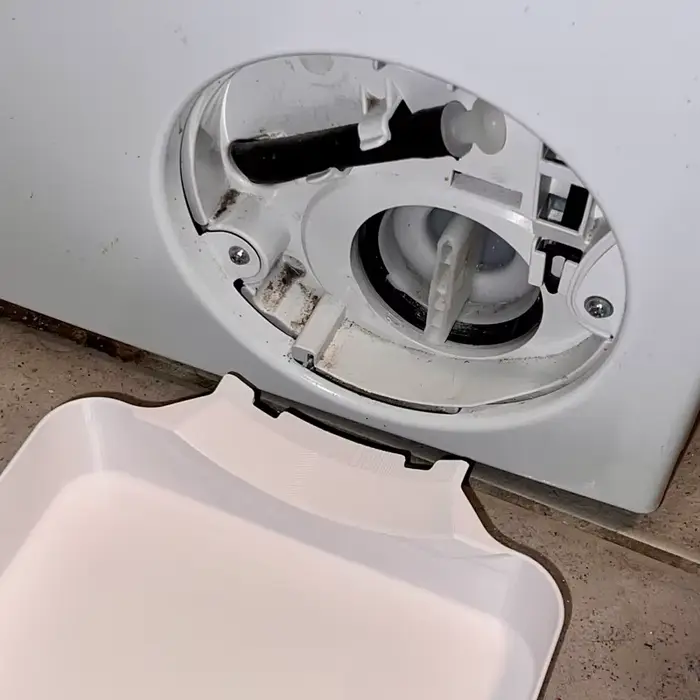Bac de nettoyage du filtre de machine à laver : récupère l'eau résiduelle et les taches de peluches