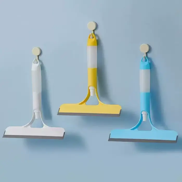 Un nettoyant pour vitres 3-en-1. Comprend une tête de brosse double face et un grattoir